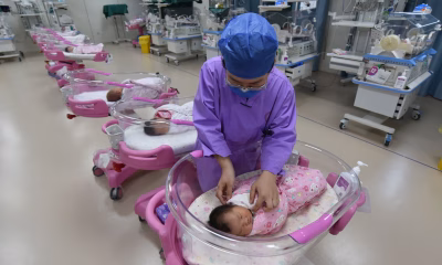 A Nurse Takes Care Of Newborn