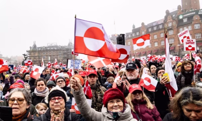Protesters Wave Greenland Flags